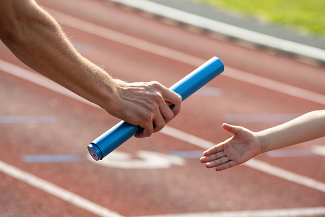 passing the baton to kids.
